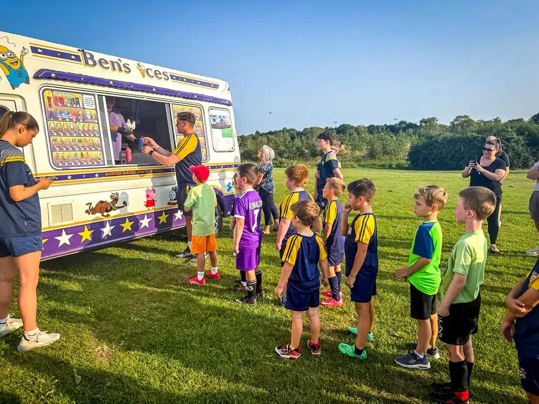 Kids playing football at a Bitrthday party