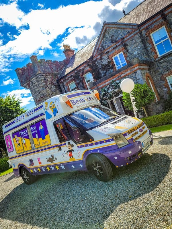 Ice cream truck outside manor house