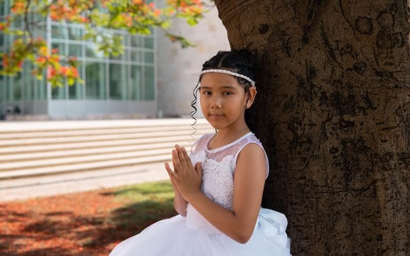 Young girl making Holy Communion