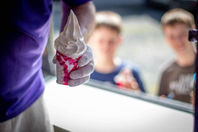 Ice cream tub with 2 boys in background